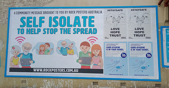 Street poster Self isolate to help stop the spread